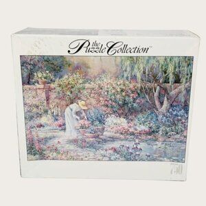RoseArt The Puzzle Collection Her Garden 750 Pc Jigsaw Puzzle 18 x 26.5 New
